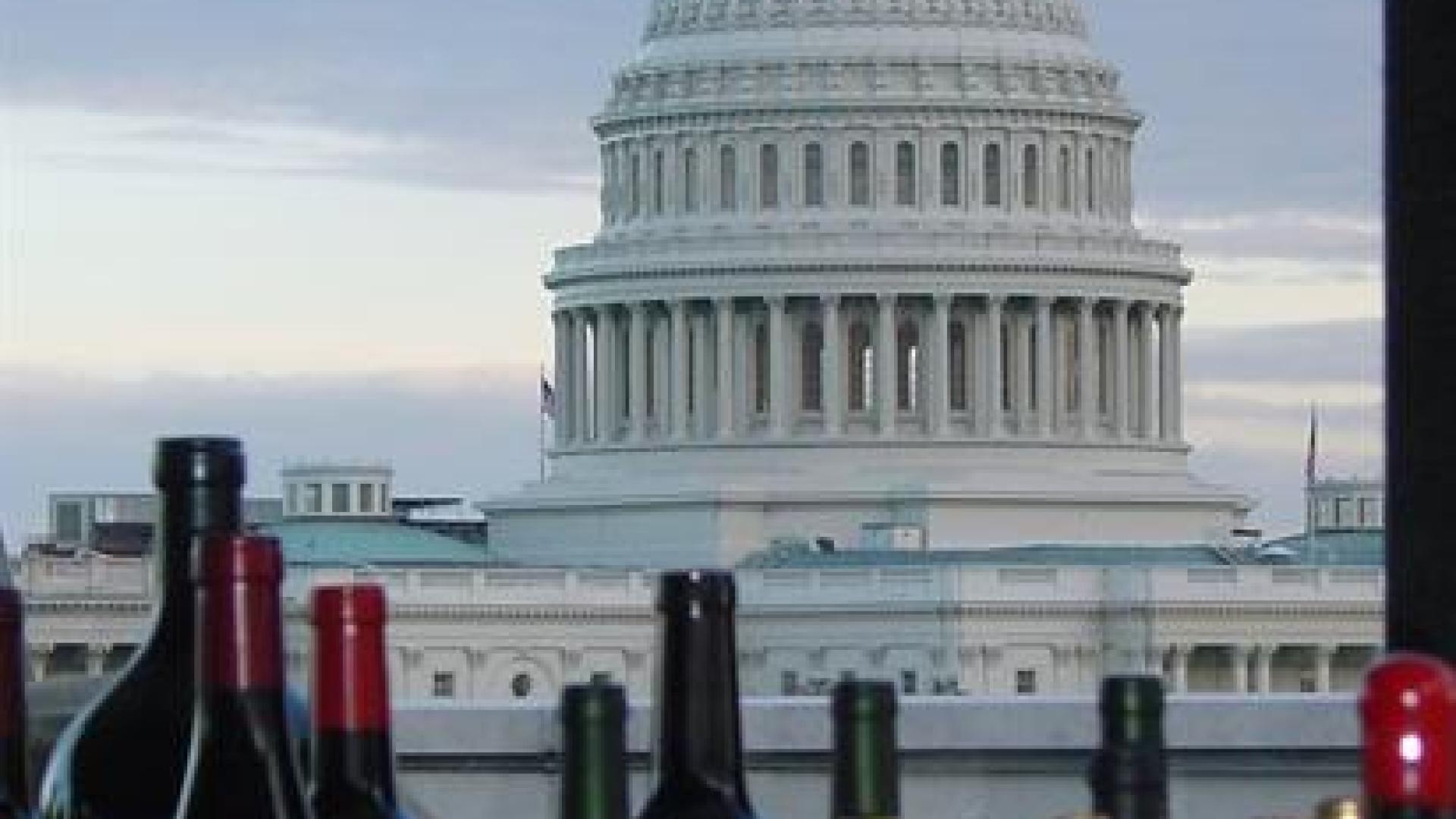 Wine bottles set against the backdrop of the U.S. Capitol.